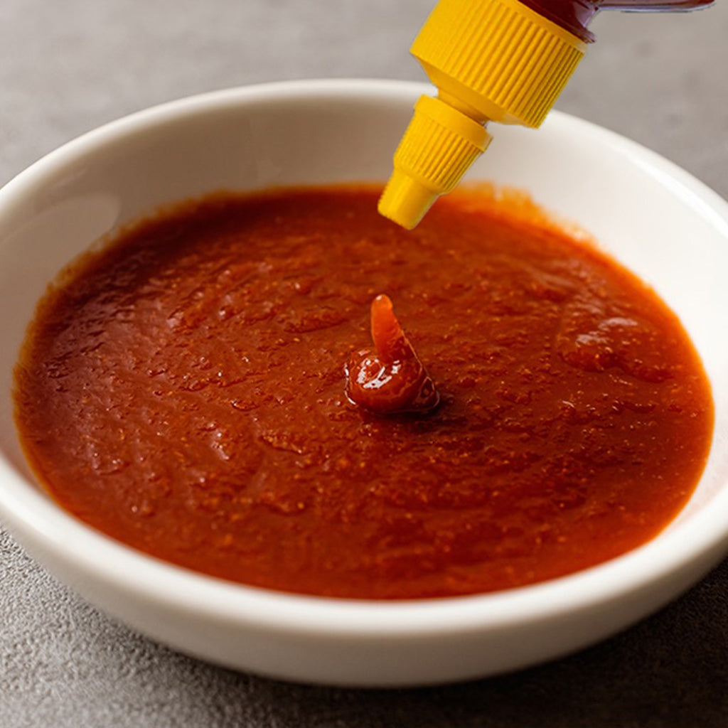 The Fiery Tale of Sriracha Sauce - A Global Culinary Icon